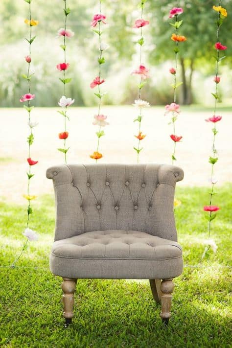 grad backdrop ideas chair with flower curtain